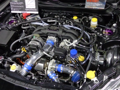 This is a flat-four engine in a GT86 that has been given the turbocharger treatment by GReddy.
