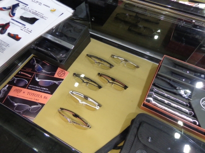 These are the eyeglasses you can get, along with tools on the right, and a sign showing available sneakers on the left.